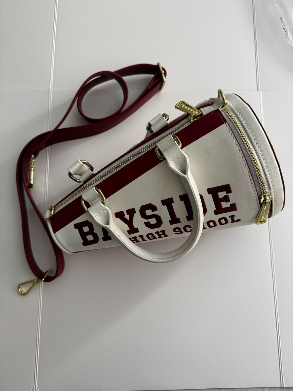Bayside  High School White and Burgundy Barrel Crossbody Bag